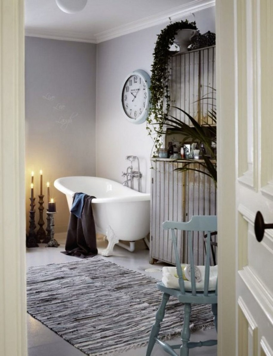 shabby-smart-bathroom-with-white-tub-and-cand
